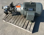 Worldwide Electric T-frame Motor PEWW60-18-364TC-F2 W/parker Attachments. Fixed Price $7500.00.